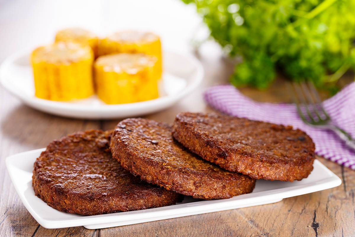 Stockfoto - 3 veggie patties on a plate