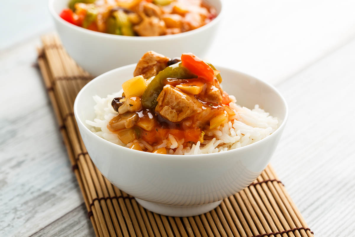 Stockfoto - Rice with sweet and sour veggies and soy meat
